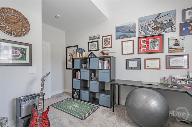 carpeted office with baseboards