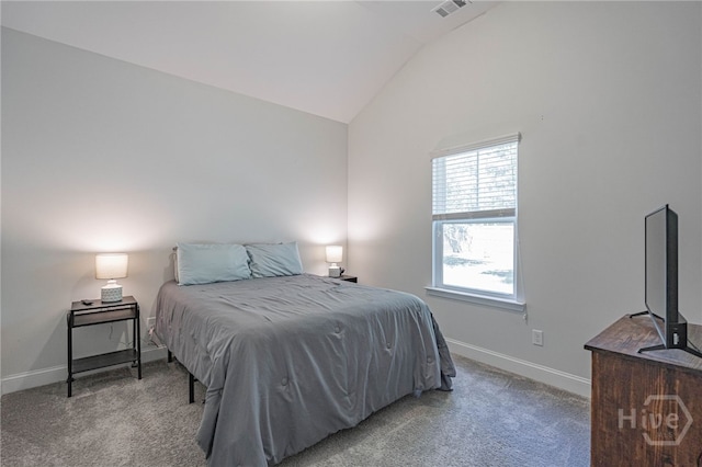 bedroom featuring lofted ceiling, light carpet, and baseboards