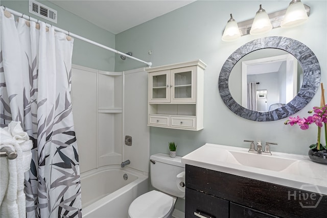 85 Van Horne Ave Unit 25C, Tybee Island, GA 31328 - bathroom featuring vanity, shower / bathtub combination with curtain, and toilet