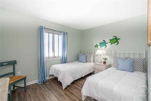 85 Van Horne Ave Unit 25C, Tybee Island, GA 31328 - bedroom with wood finished floors and baseboards