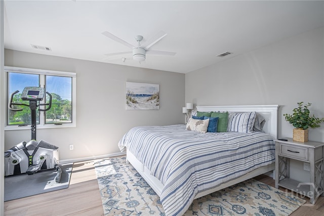 3005 River Dr Unit 209B, Savannah, GA 31404 - bedroom with wood finished floors, baseboards, and a ceiling fan