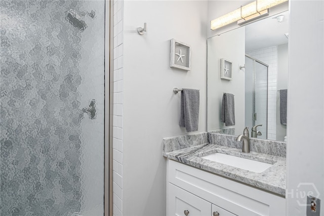 3005 River Dr Unit 209B, Savannah, GA 31404 - bathroom with a stall shower and vanity