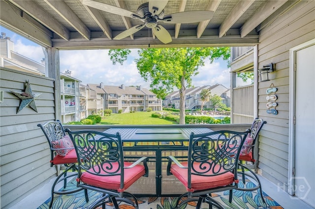 3005 River Dr Unit 209B, Savannah, GA 31404 - deck with a ceiling fan and a residential view