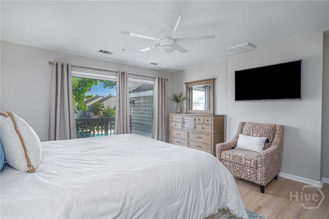 3005 River Dr Unit 209B, Savannah, GA 31404 - bedroom with wood finished floors, baseboards, and ceiling fan