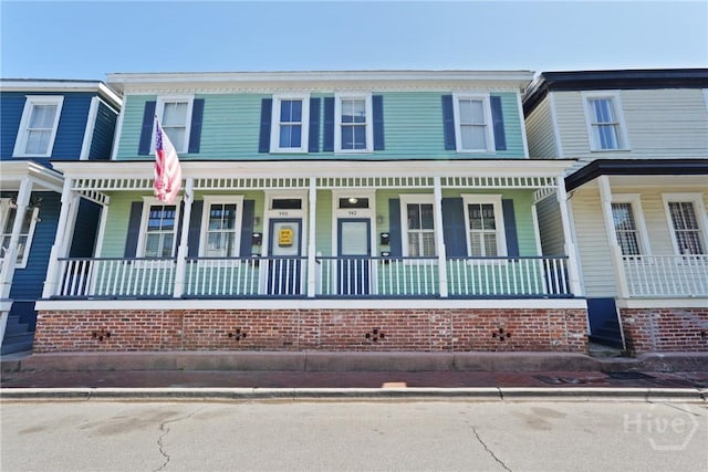 542 E Gaston St Unit A, Savannah, GA 31401 - townhome / multi-family property with covered porch