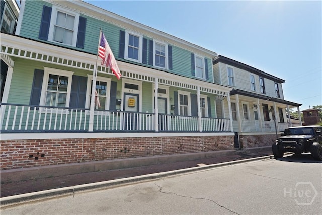 542 E Gaston St Unit A, Savannah, GA 31401 - townhome / multi-family property featuring a porch