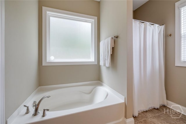 bathroom with a bath, tile patterned flooring, a shower with shower curtain, and baseboards