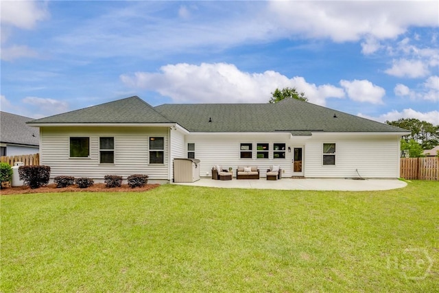 rear view of property with outdoor lounge area, a patio, and roof with shingles
