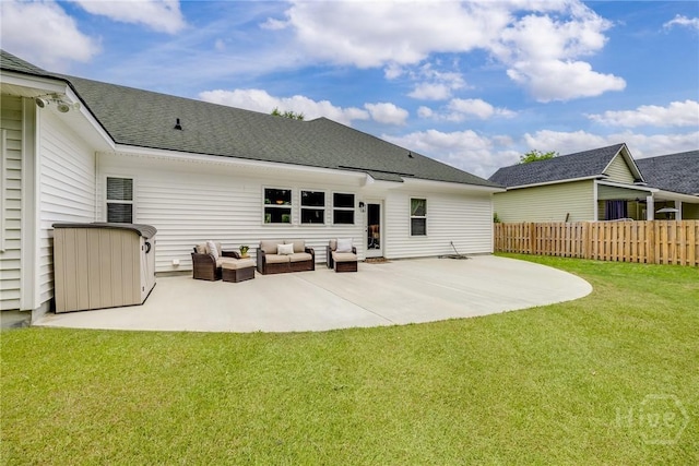 rear view of house featuring a patio, an outdoor hangout area, and a shingled roof