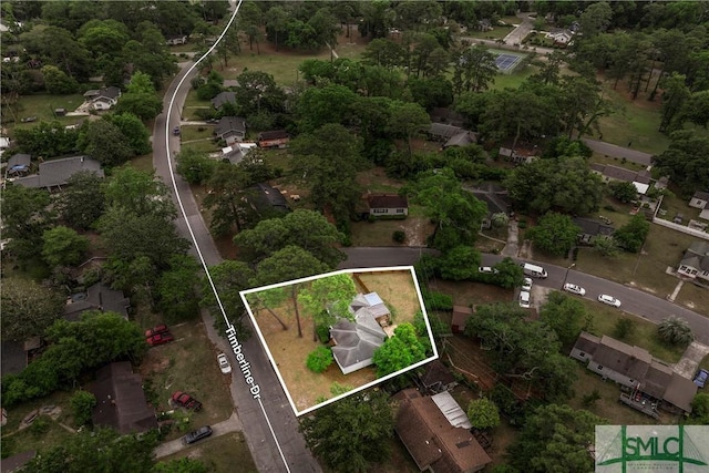aerial view of property and surrounding area with property boundaries highlighted