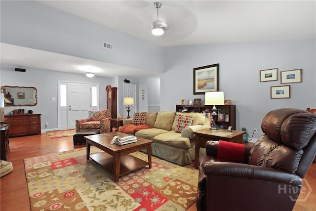 6 Ramsgate Rd, Savannah, GA 31419 - living room featuring wood finished floors, vaulted ceiling, a ceiling fan, and baseboards