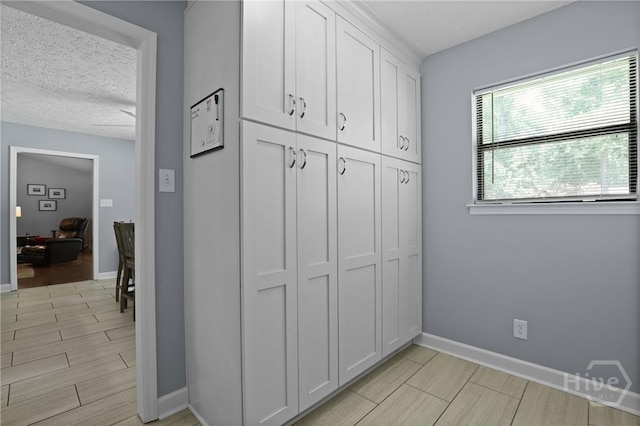6 Ramsgate Rd, Savannah, GA 31419 - corridor with baseboards and a textured ceiling