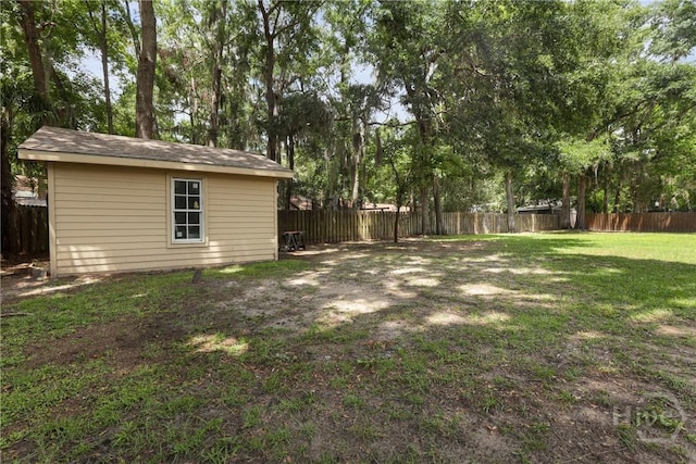 6 Ramsgate Rd, Savannah, GA 31419 - view of yard featuring an outbuilding and view of wooded area