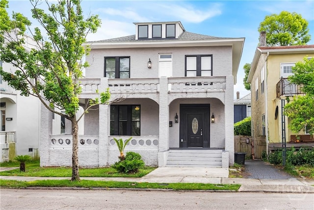 523 E 39th St, Savannah, GA 31401 - view of front of home featuring a porch and stucco siding