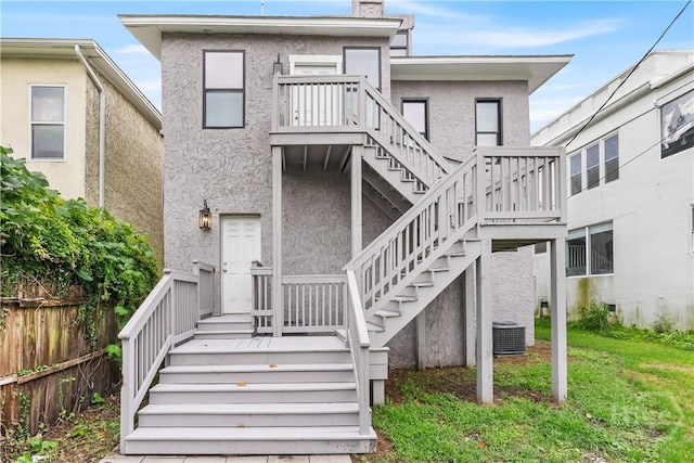 523 E 39th St, Savannah, GA 31401 - back of property with stairway, stucco siding, and cooling unit