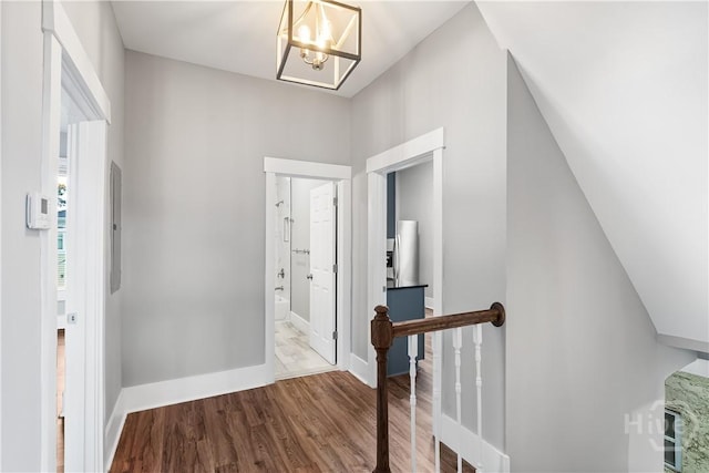 523 E 39th St, Savannah, GA 31401 - entrance foyer featuring wood finished floors, a chandelier, and baseboards