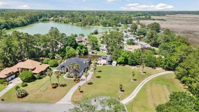 view of property location with a large body of water and nearby suburban area