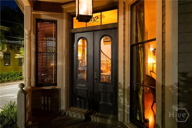 102 E 38th St, Savannah, GA 31401 - entrance to property featuring french doors and covered porch