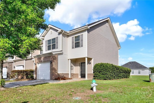 450 Canyon Oak Loop, Richmond Hill, GA 31324 - traditional-style home with a front lawn, a garage, asphalt driveway, and brick siding