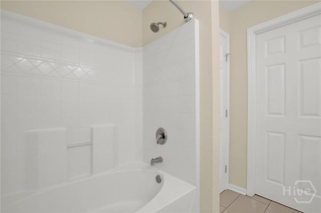 450 Canyon Oak Loop, Richmond Hill, GA 31324 - full bath featuring tile patterned flooring, bathtub / shower combination, and baseboards