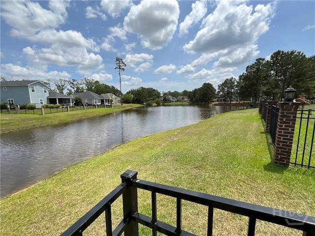 water view featuring fence