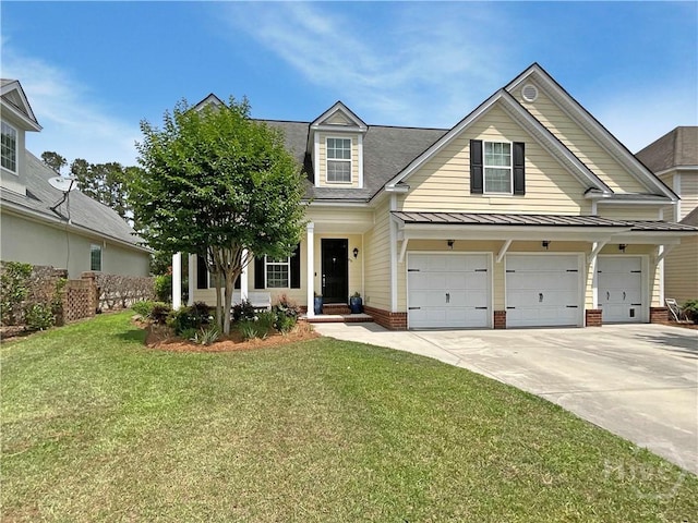 66 Misty Marsh Dr, Savannah, GA 31419 - traditional-style house featuring an attached garage, concrete driveway, a front lawn, a standing seam roof, and roof with shingles