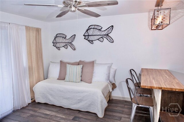 1217 Bay St Unit 131A, Tybee Island, GA 31328 - bedroom featuring wood finished floors and a ceiling fan