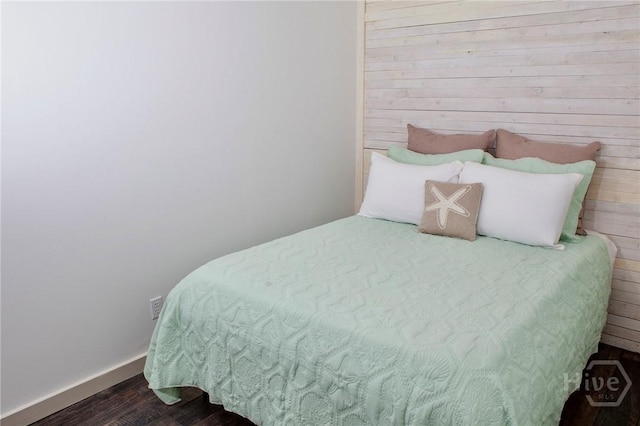 1217 Bay St Unit 131A, Tybee Island, GA 31328 - bedroom featuring wood finished floors and wood walls