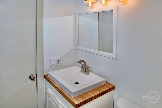 1217 Bay St Unit 131A, Tybee Island, GA 31328 - half bathroom with vanity and toilet