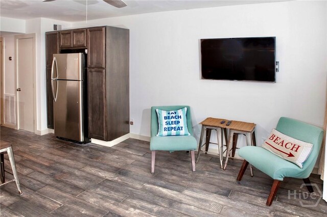 1217 Bay St Unit 131A, Tybee Island, GA 31328 - sitting room with dark wood finished floors and ceiling fan