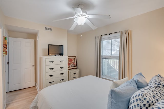 18 Silver Ave Unit 1, Tybee Island, GA 31328 - bedroom with light wood-type flooring and ceiling fan