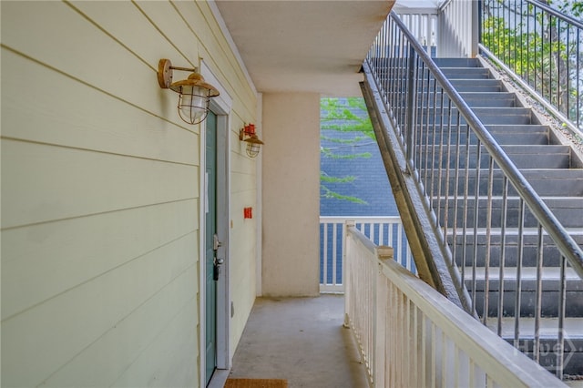 18 Silver Ave Unit 1, Tybee Island, GA 31328 - balcony featuring stairway