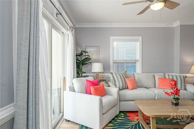 18 Silver Ave Unit 1, Tybee Island, GA 31328 - living room with healthy amount of natural light, crown molding, and ceiling fan