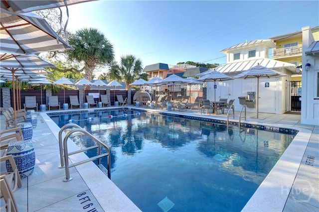 18 Silver Ave Unit 1, Tybee Island, GA 31328 - community pool with a patio and a residential view