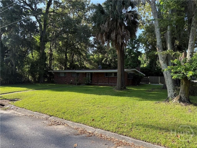 single story home with brick siding
