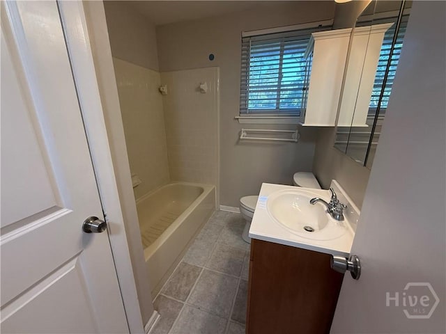 full bathroom with toilet, tile patterned floors, vanity, shower / bath combination, and baseboards