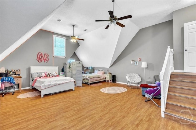 473 Kolic Helmey Rd, Guyton, GA 31312 - bedroom featuring light wood-style flooring, vaulted ceiling, baseboards, and ceiling fan