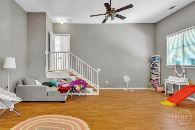473 Kolic Helmey Rd, Guyton, GA 31312 - recreation room featuring wood finished floors, ceiling fan, and baseboards