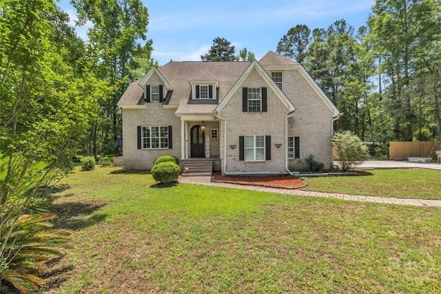 473 Kolic Helmey Rd, Guyton, GA 31312 - traditional-style home featuring brick siding