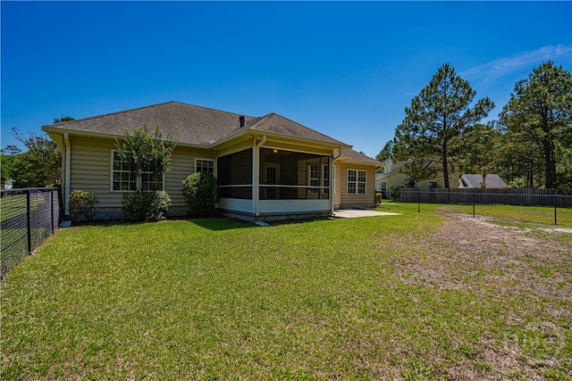 110 Pembroke Pl, Pembroke, GA 31321 - rear view of house featuring a sunroom