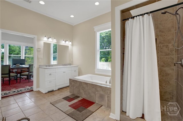 835 E Duffy St, Savannah, GA 31401 - bathroom featuring healthy amount of natural light, tile patterned flooring, a bath, vanity, and recessed lighting