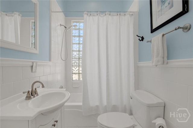 835 E Duffy St, Savannah, GA 31401 - full bath featuring tile walls, toilet, shower / tub combo, and vanity