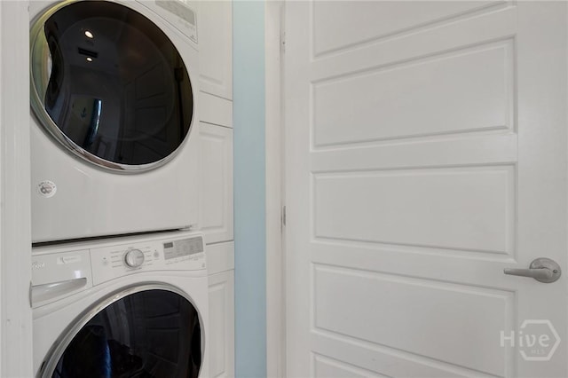 835 E Duffy St, Savannah, GA 31401 - clothes washing area with stacked washing machine and dryer