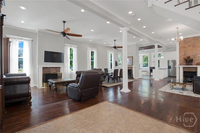 835 E Duffy St, Savannah, GA 31401 - living room featuring a fireplace, ceiling fan, recessed lighting, wood-type flooring, and crown molding