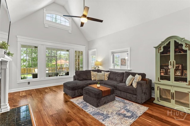 2 Misty Marsh Ct, Savannah, GA 31419 - living room featuring high vaulted ceiling, a fireplace, a ceiling fan, and wood finished floors