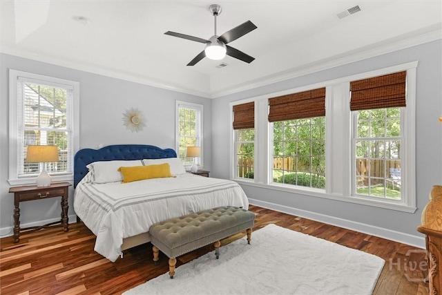 2 Misty Marsh Ct, Savannah, GA 31419 - bedroom with multiple windows, wood finished floors, baseboards, and ceiling fan