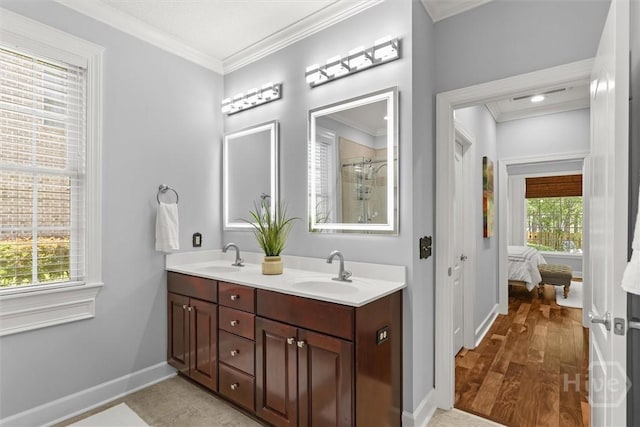 2 Misty Marsh Ct, Savannah, GA 31419 - bathroom with crown molding, baseboards, ensuite bath, double vanity, and a shower