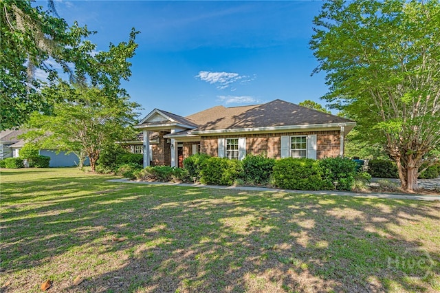 417 Willowpeg Way, Rincon, GA 31326 - view of front of property with a front yard and brick siding