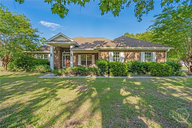 417 Willowpeg Way, Rincon, GA 31326 - view of front of house featuring a front lawn and brick siding