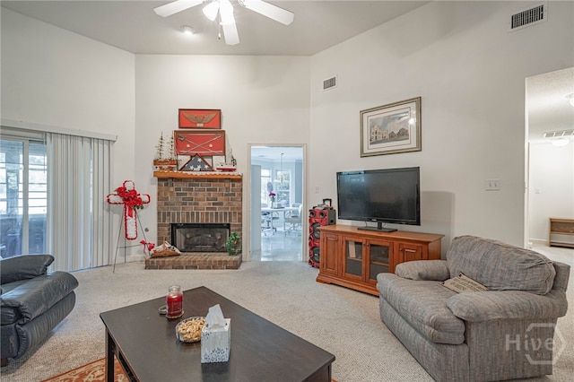 417 Willowpeg Way, Rincon, GA 31326 - living area featuring carpet floors, high vaulted ceiling, ceiling fan, and a brick fireplace